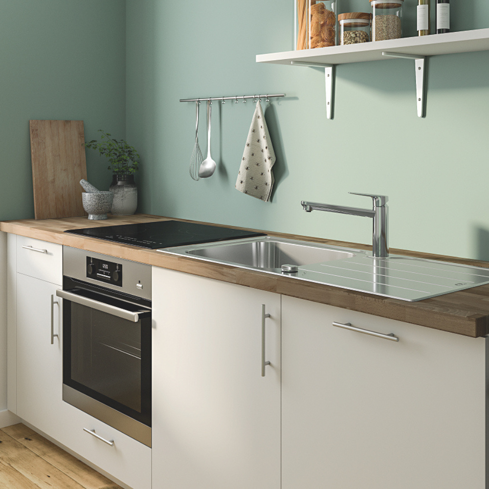 Robinet de cuisine bec médium GROHE Quickfix Start Curve chromé dans cuisine propre