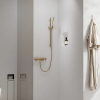 Ambiance Ensemble barre de douche HANSGROHE Unica S Puro + Flexible + Pommeau de douche Pulsify S Bronze Brossé