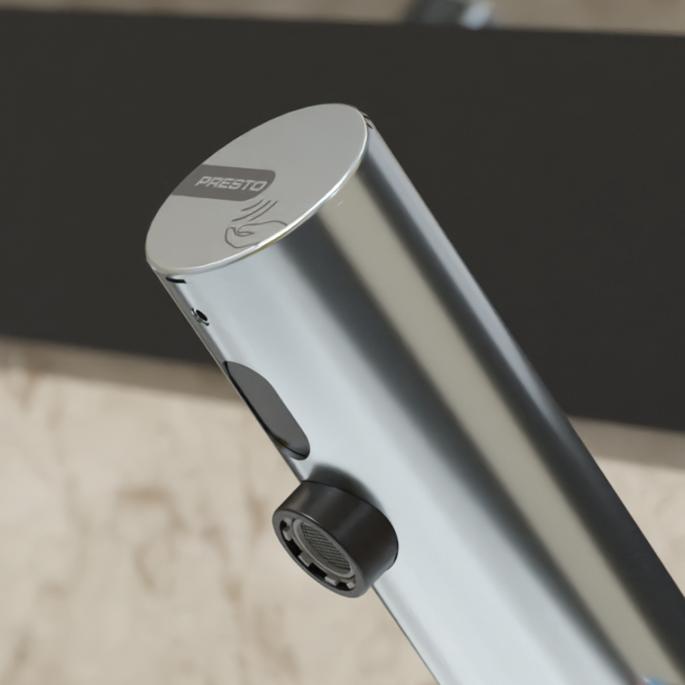 Zoom ambiance Mitigeur infrarouge sur plage avec robinet d'arrêt pour lavabo PRESTO Linea chromé