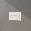 Zoom sur la plaque de commande VITRA Root Round chromé