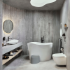 Abattant WC frein de chute compact déclipsable rond ROCA Ona blanc sur WC suspendu moderne
