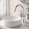 Mitigeur lavabo bec haut mobile PAINI Stone chromé dans salle de bain lumineuse