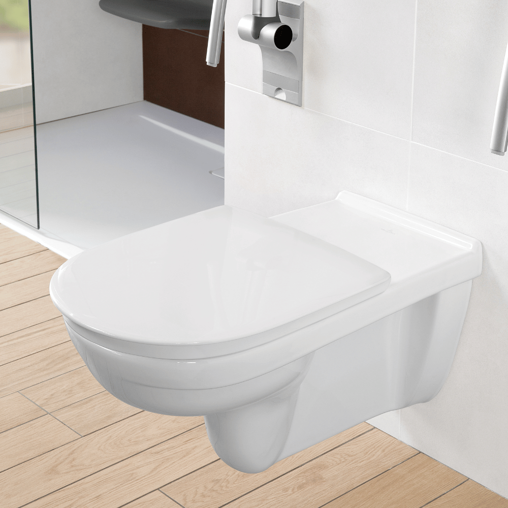 Zoom sur la cuvette WC suspendu PMR sans bride VILLEROY & BOCH ViCare blanc + Abattant